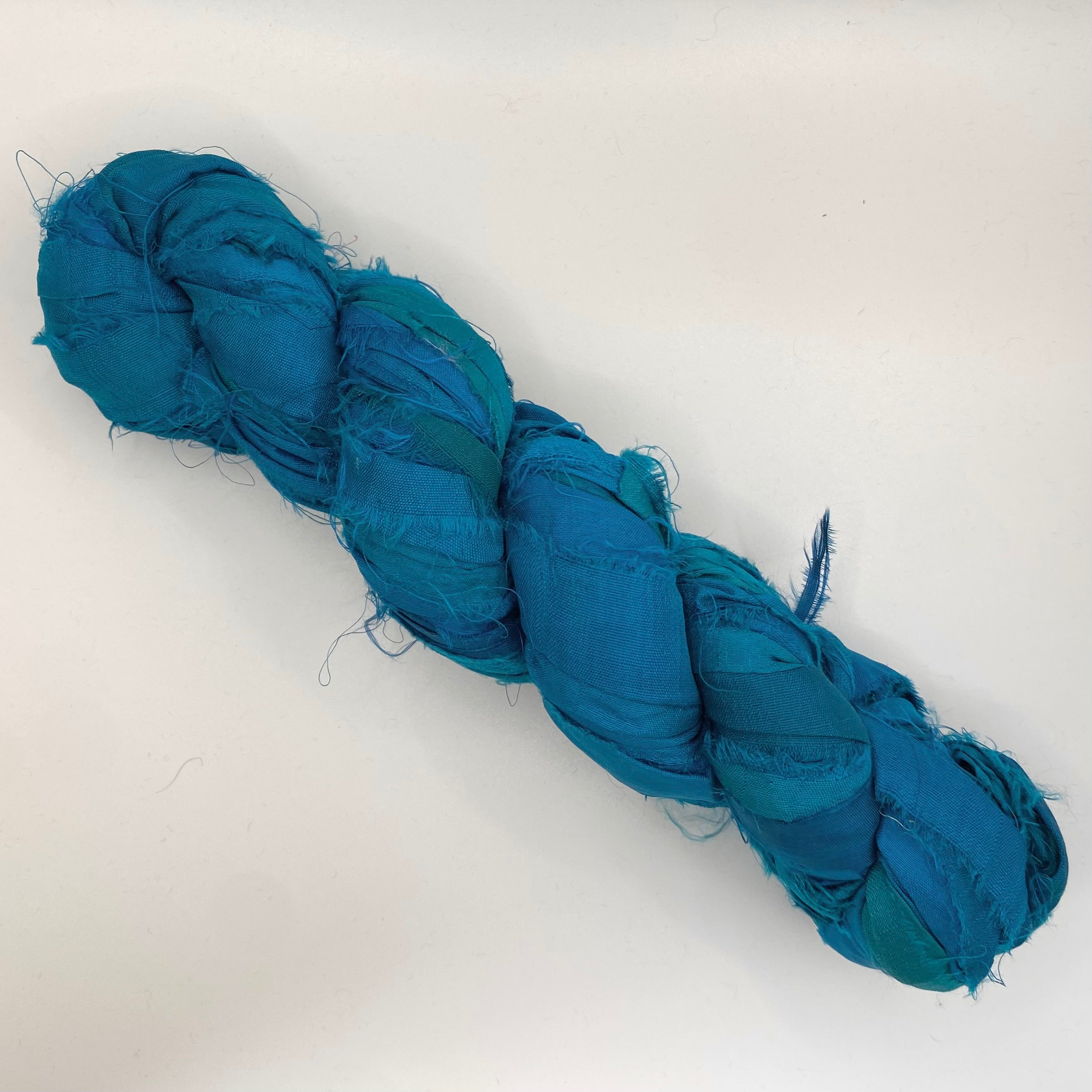 Recycled sari silk ribbon yarn